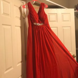 Red maxi dress. Lace up back. NEVER WORN